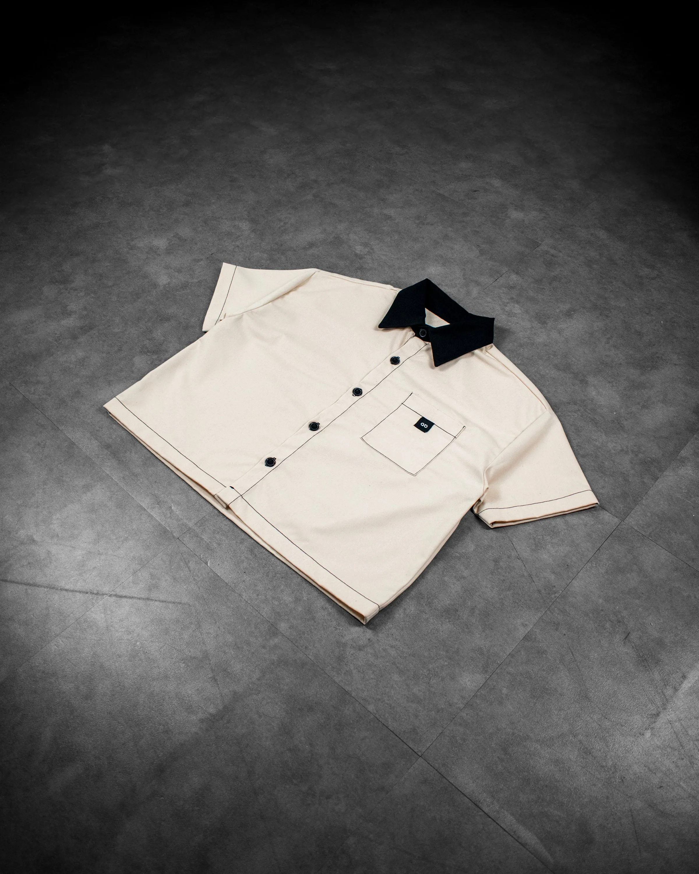 cropped polo shirt | button-down | drop shoulder | dual-tone and box fit | classic twill | crème