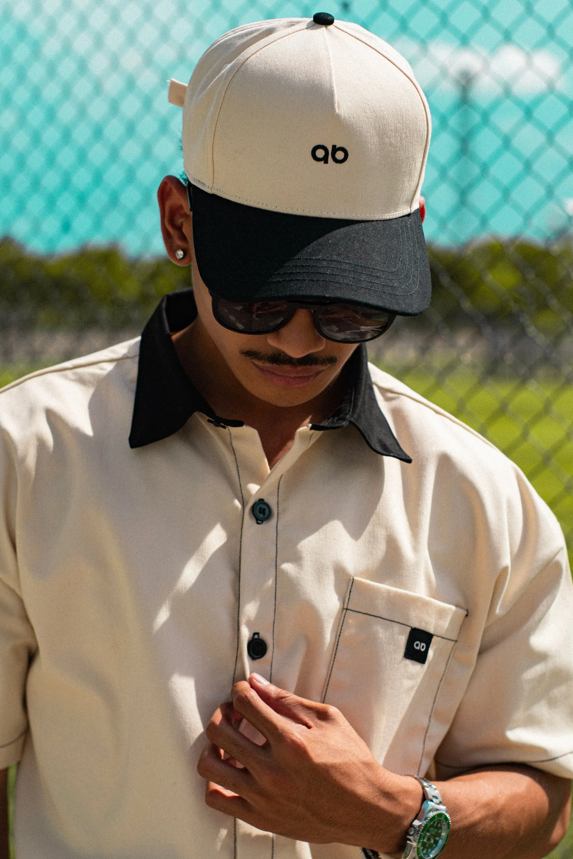 cropped polo shirt | button-down | drop shoulder | dual-tone and box fit | classic twill | crème